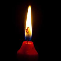 Pixwords L`immagine con il fuoco, candela, buio Ginasanders - Dreamstime